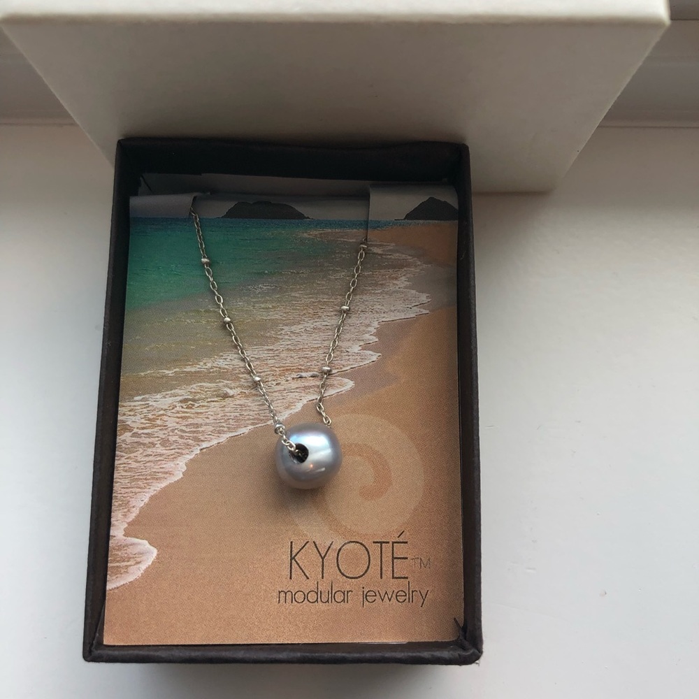 Necklace with back dangle